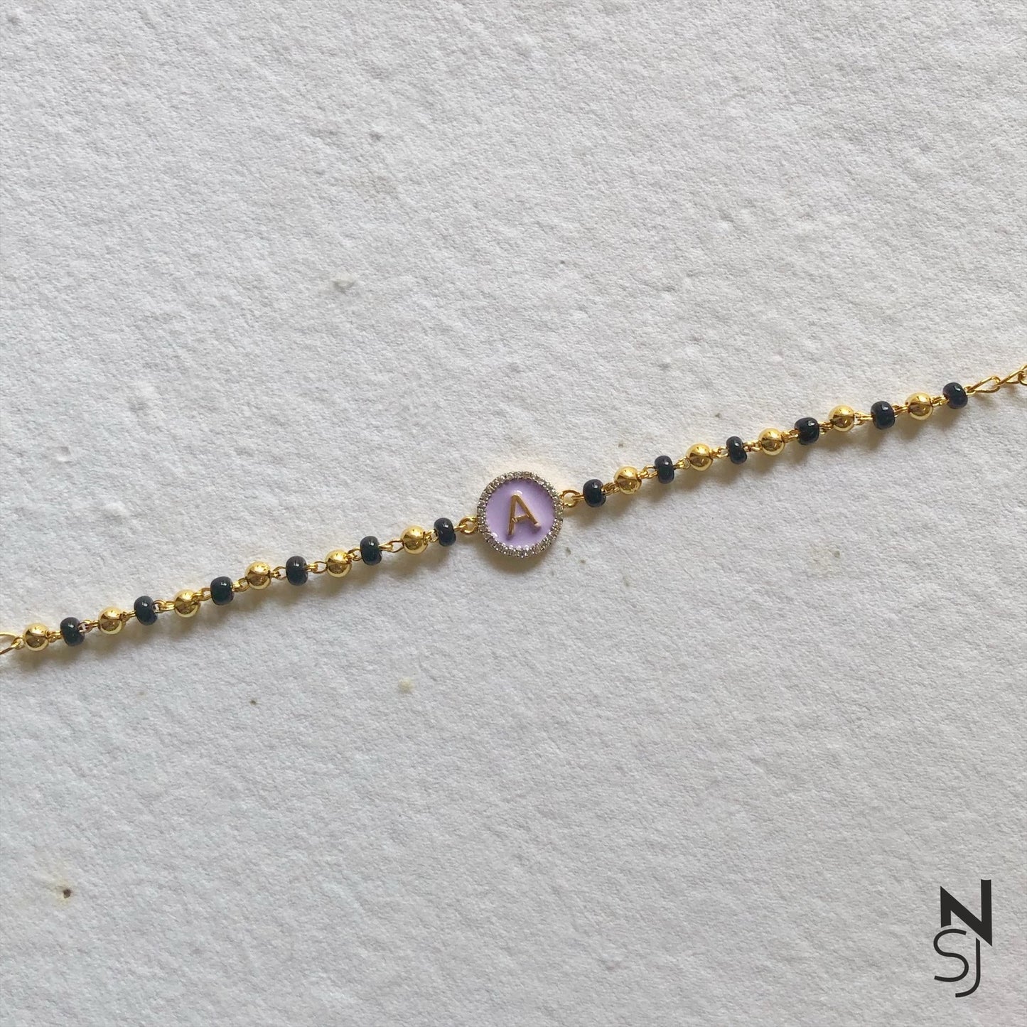 Studded Initial Nazariya